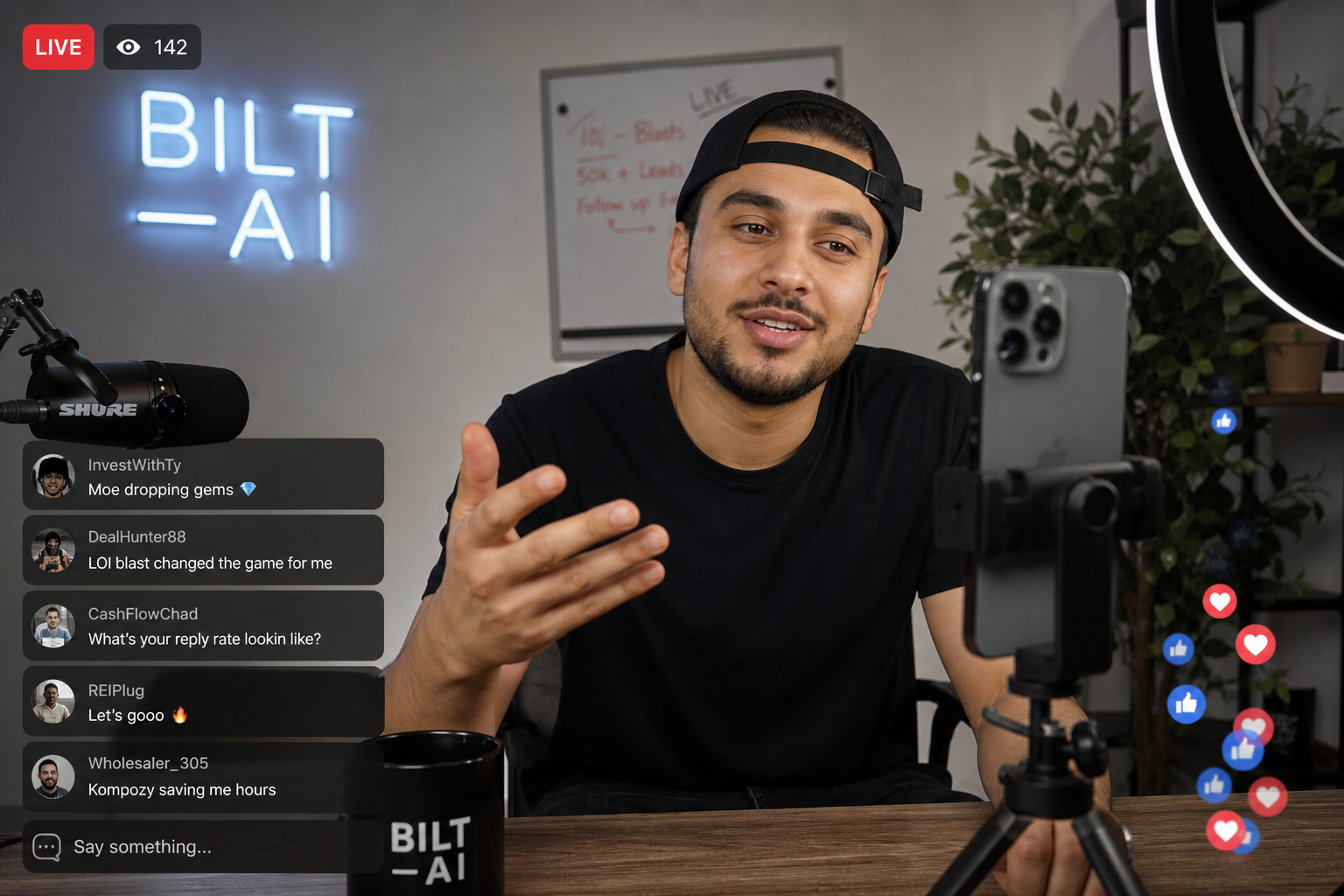 person hosting a live stream from a small studio, phone mounted on tripod, comments floating on screen, casual setup with ring light, realistic environment