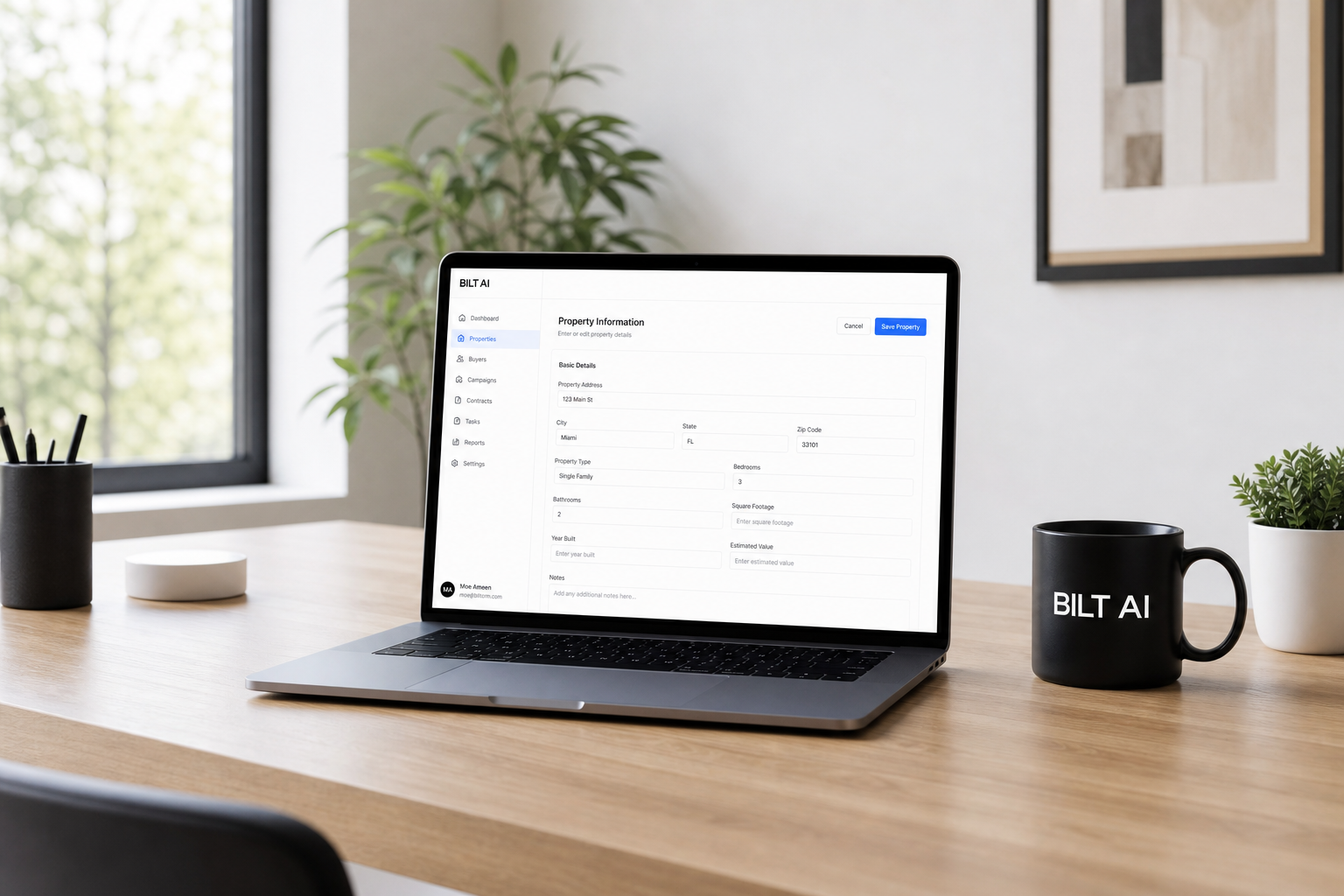 clean workspace with a laptop showing a structured data form, no open documents, minimal setup, bright daylight, organized and calm aesthetic